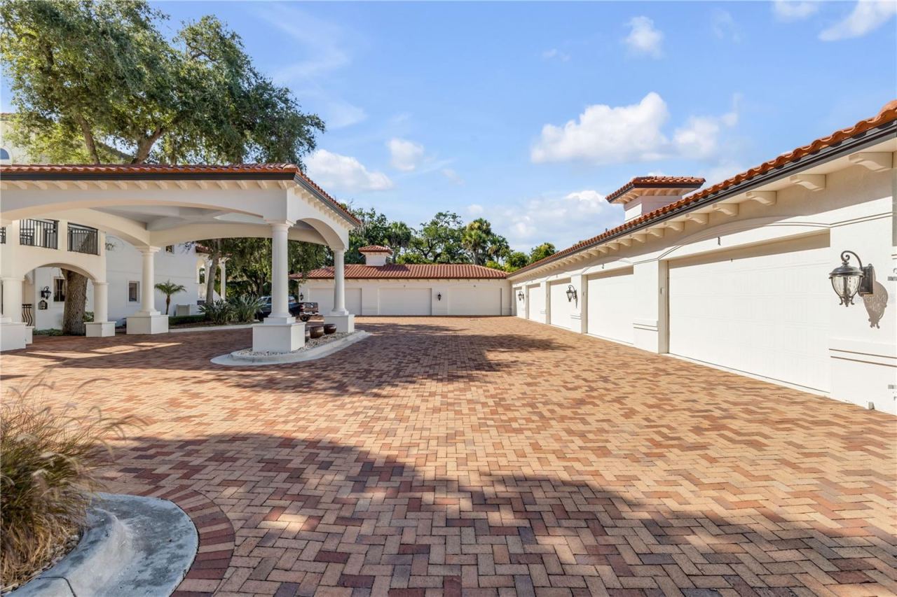 Photo 5 of 20: Paver parking lot, private garage, portico