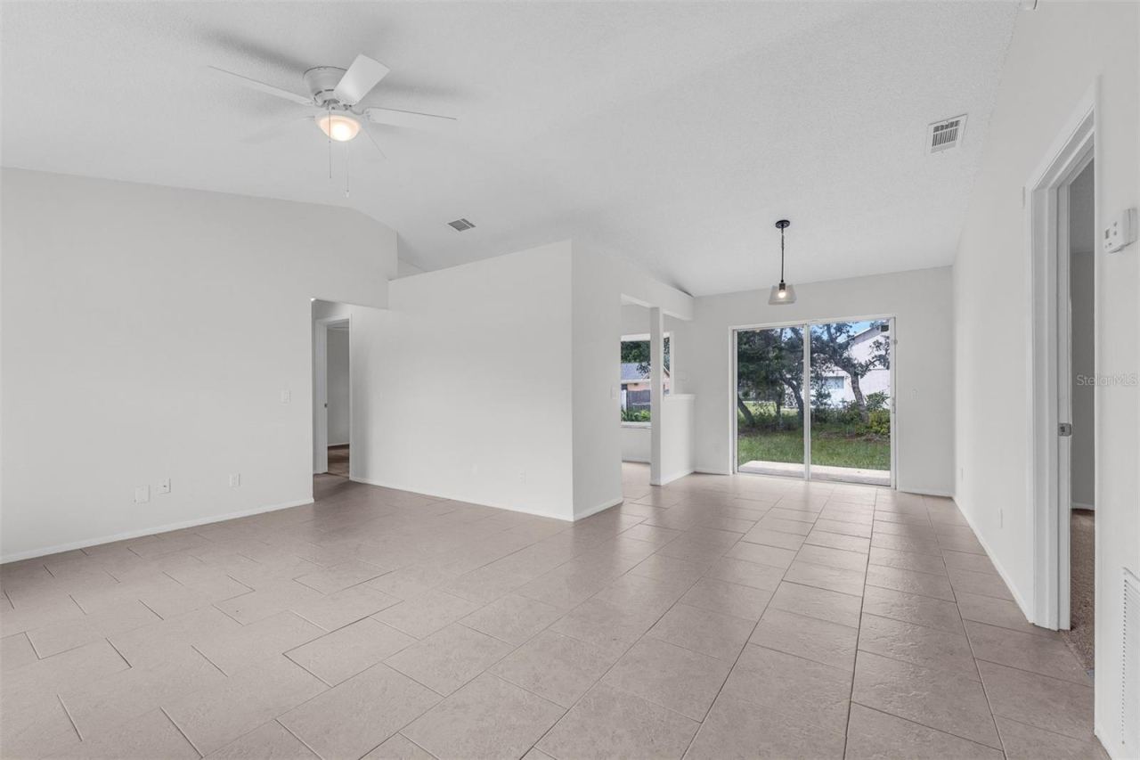 Photo 4 of 17: Open Floor plan- Dining room sliding doors to back yard