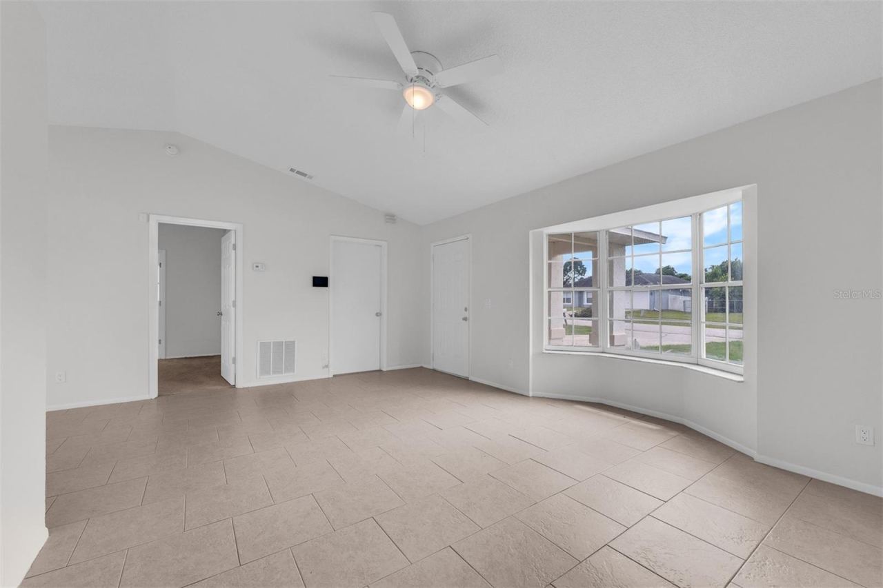Photo 5 of 17: Living room with large bay window for lots of light