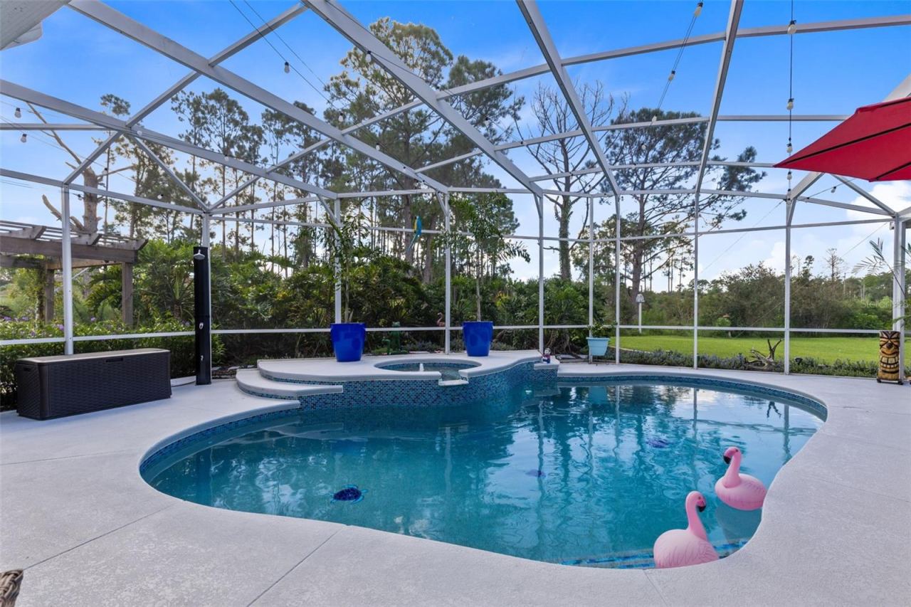 Photo 3 of 20: Screened Pool and Two Wonderful Lanais