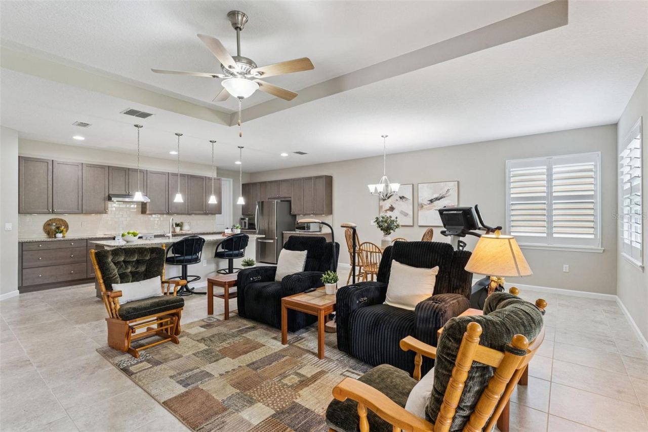 Photo 12 of 20: View of the Kitchen & Dining Room areas from the Great Room
