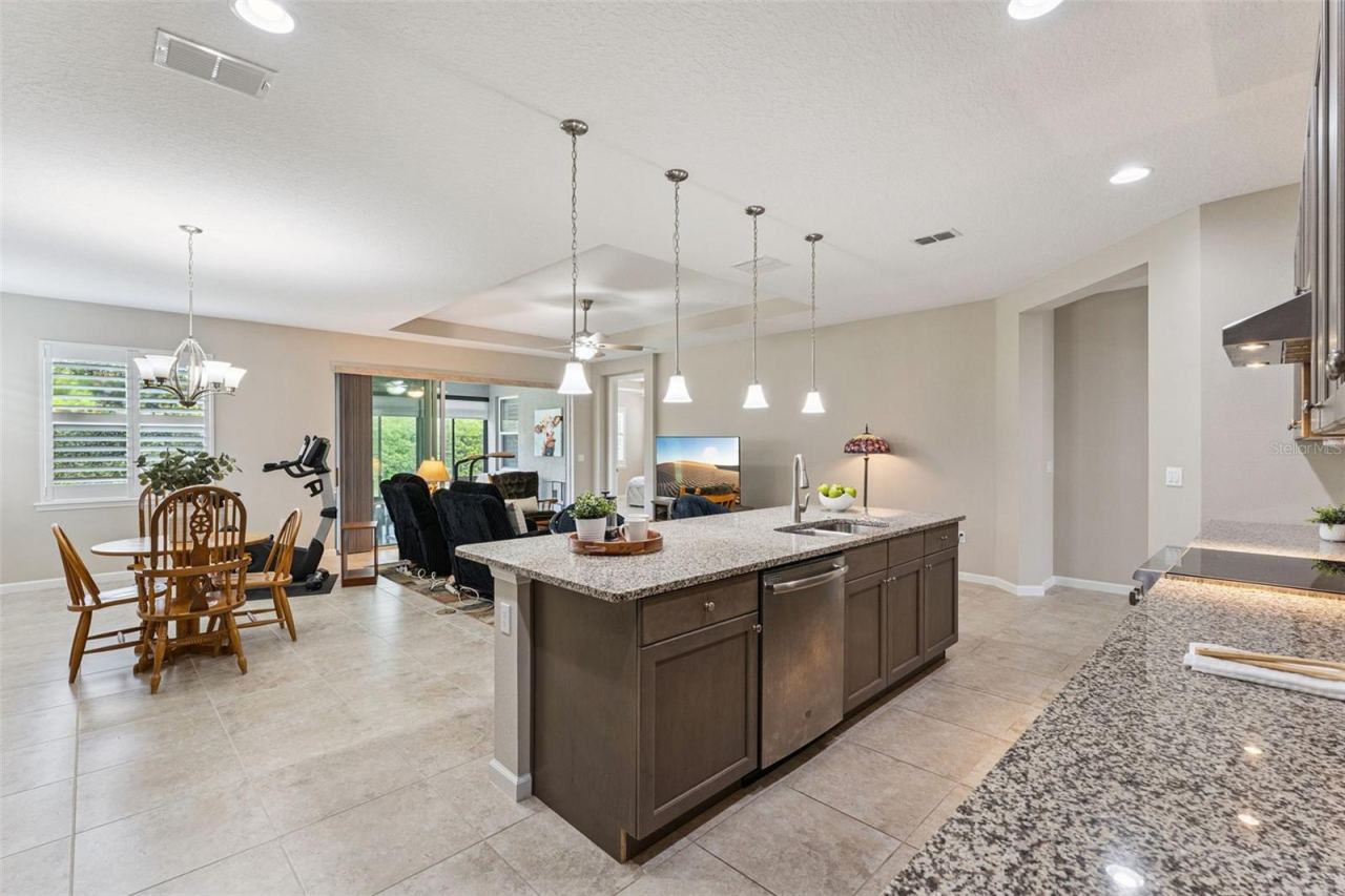 Photo 9 of 20: View of the Dining & Great Room areas from the Kitchen