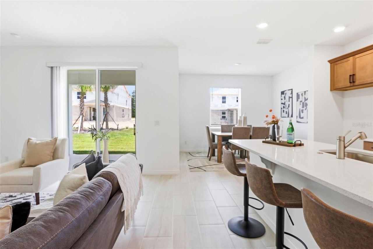Photo 16 of 20: Great Room / Kitchen / Dining