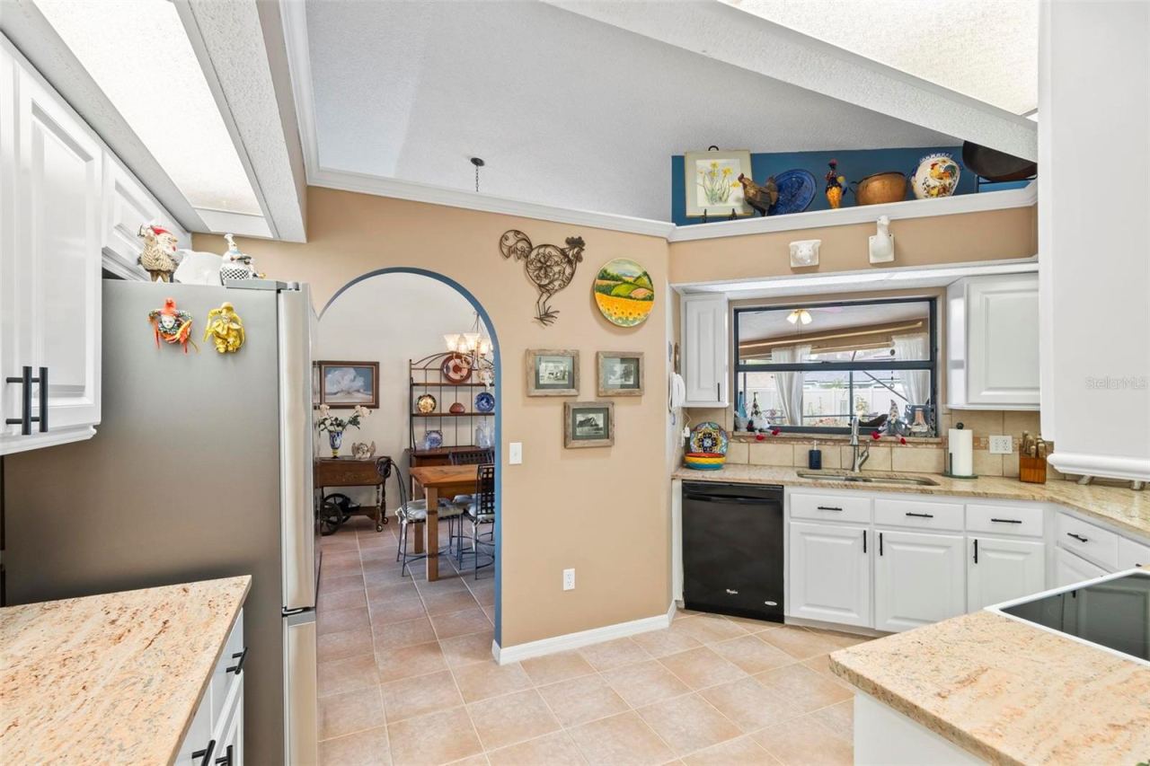 Photo 14 of 20: KItchen open to Dining Room
