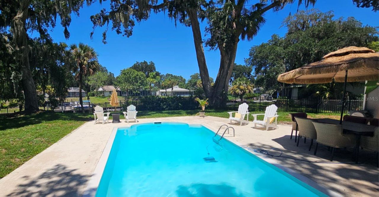 Photo 3 of 18: Huge pool. 8 ft deep.