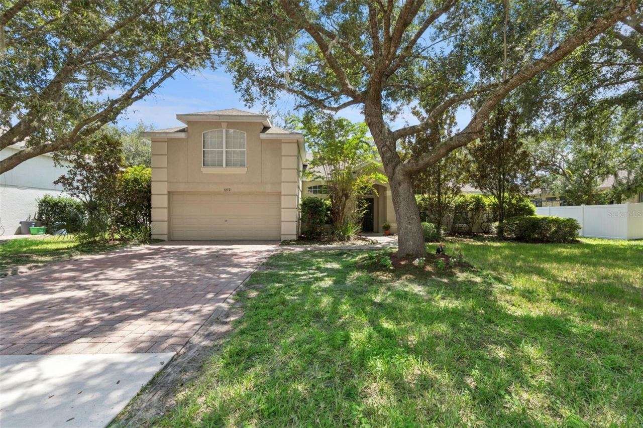Photo 1 of 20: Beautiful curb appeal and mature landscaping welcoming you home