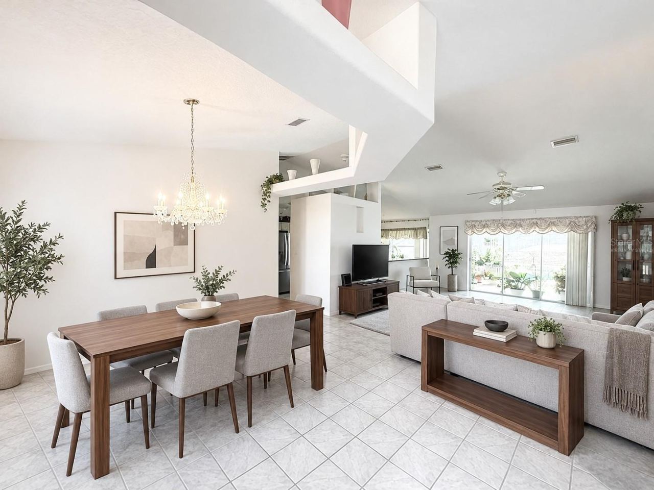 Photo 4 of 20: Virtually Staged - Dining Room & Living Room