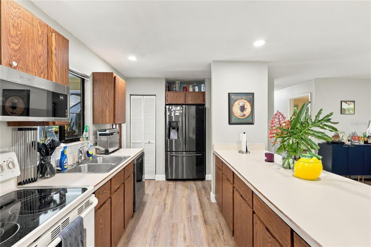 Photo 14 of 20: Kitchen- Lots of Storage! Beautiful Breakfast Bar- Open Concept!