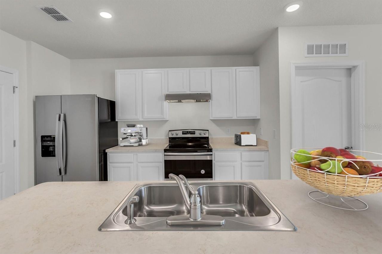 Photo 4 of 19: Kitchen - virtually staged