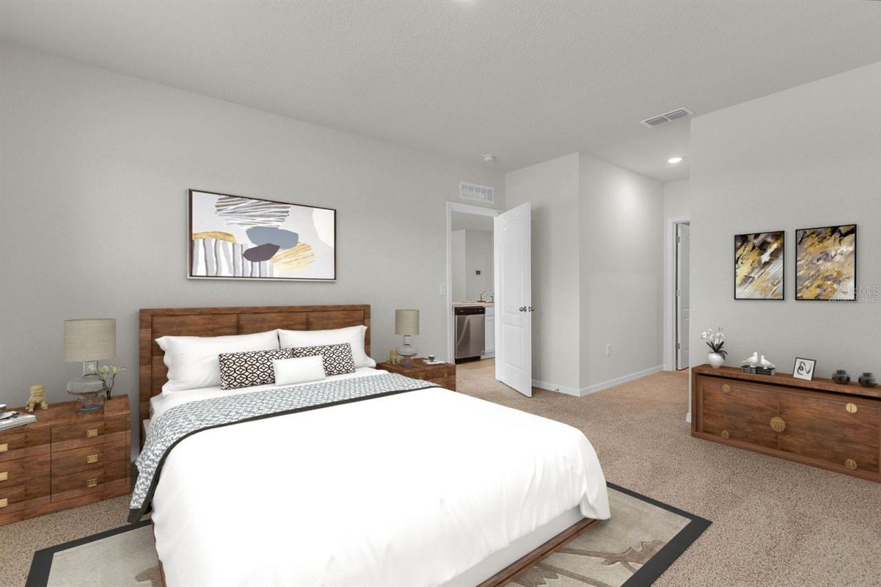 Photo 9 of 19: Primary bedroom - virtually staged