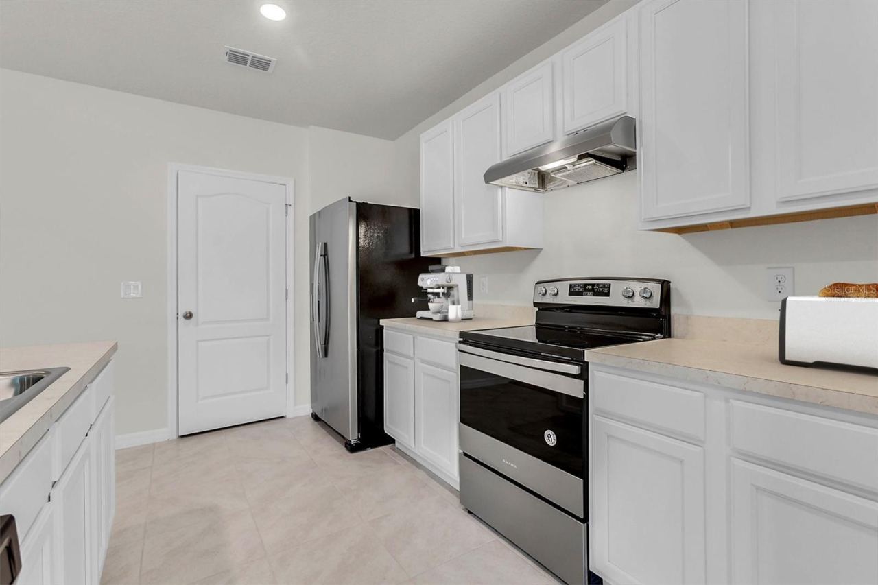 Photo 5 of 19: Kitchen - virtually staged