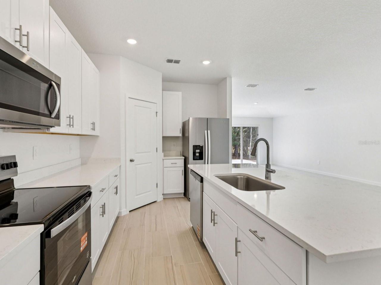 Photo 3 of 12: Photos are not of the actual home, but are photos of the builder home with same floorplan