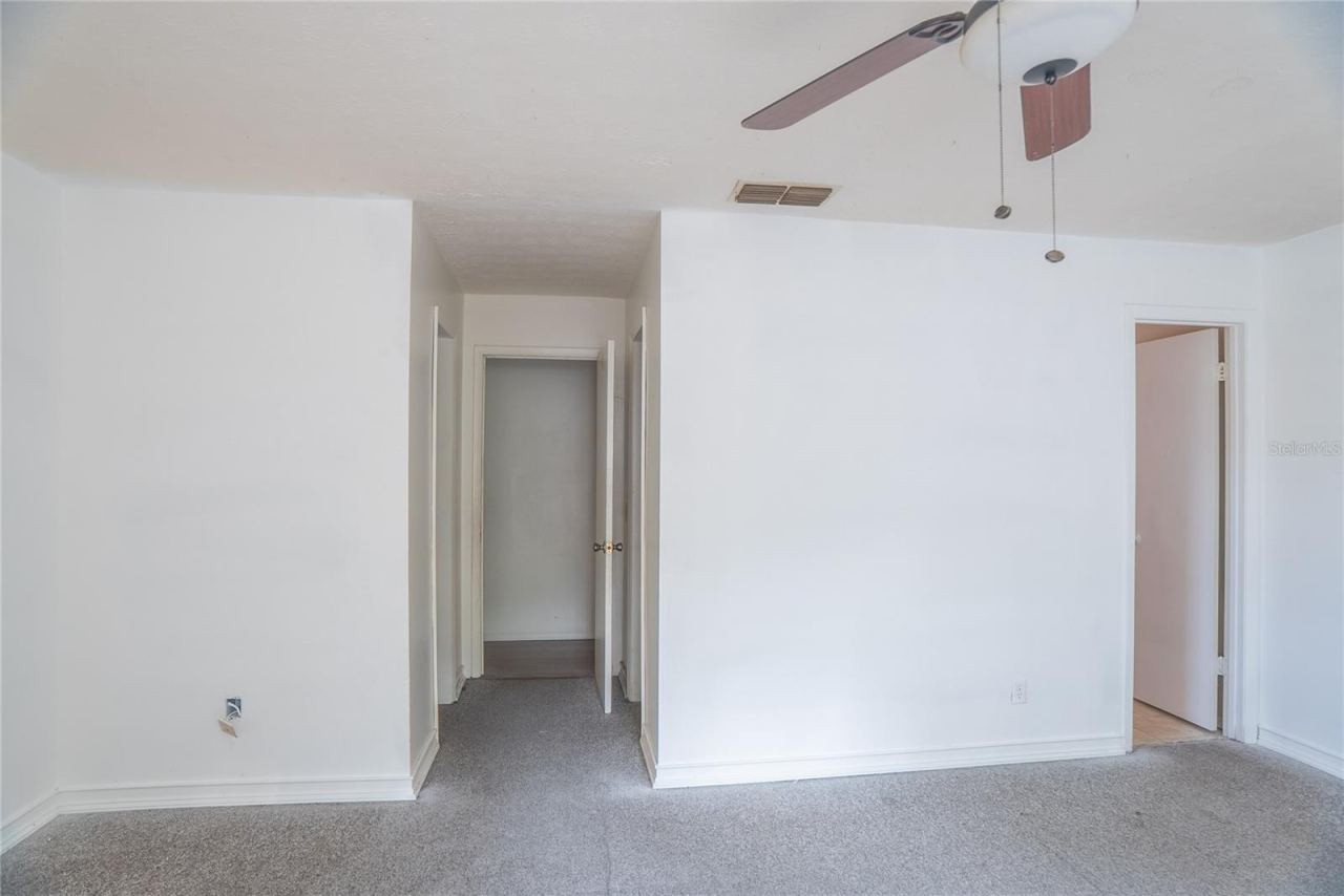 Photo 17 of 20: Dual Closets and Ensuite bathroom with shower in primary bedroom