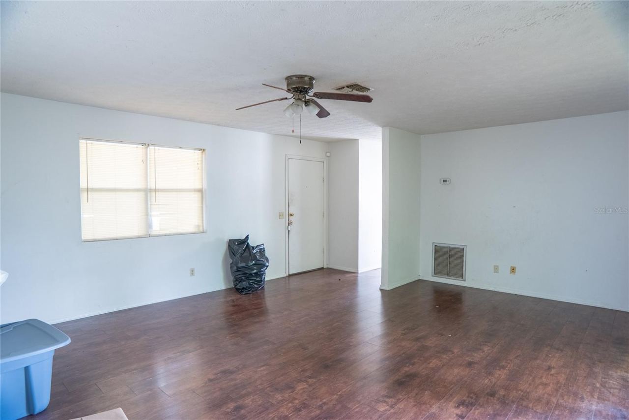 Photo 10 of 20: Living Room showing front door