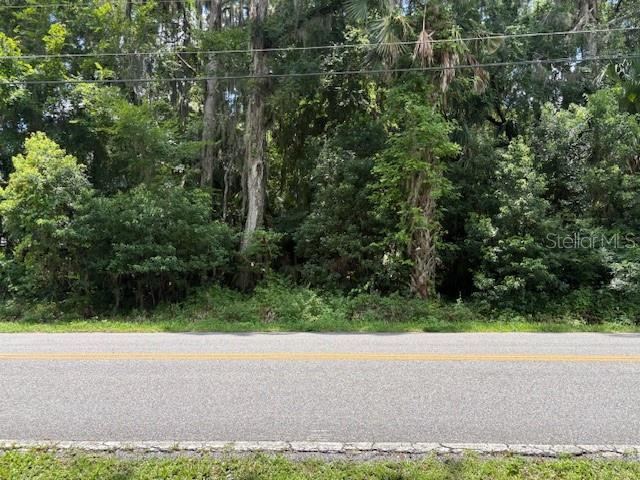 Photo 2 of 12: Canal front 1/2 acre lot