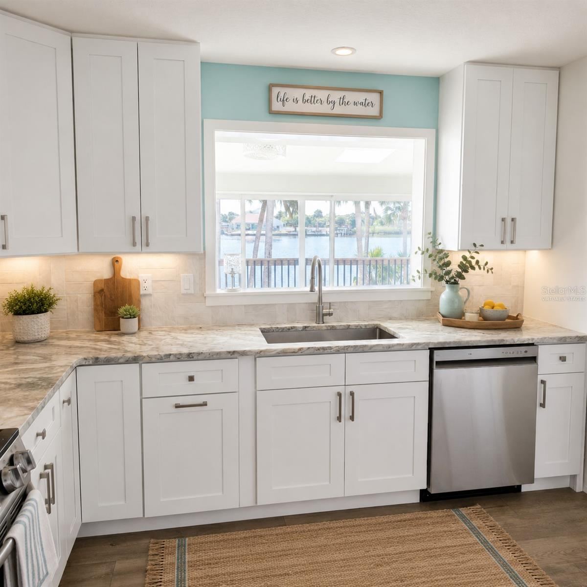 Photo 13 of 20: Virtually Staged. Kitchen View from the sink and another way to enjoy the view of the water.