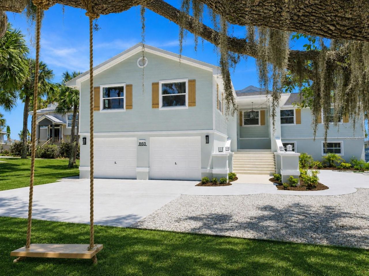 Photo 3 of 20: Front View of Home under the Oak tree