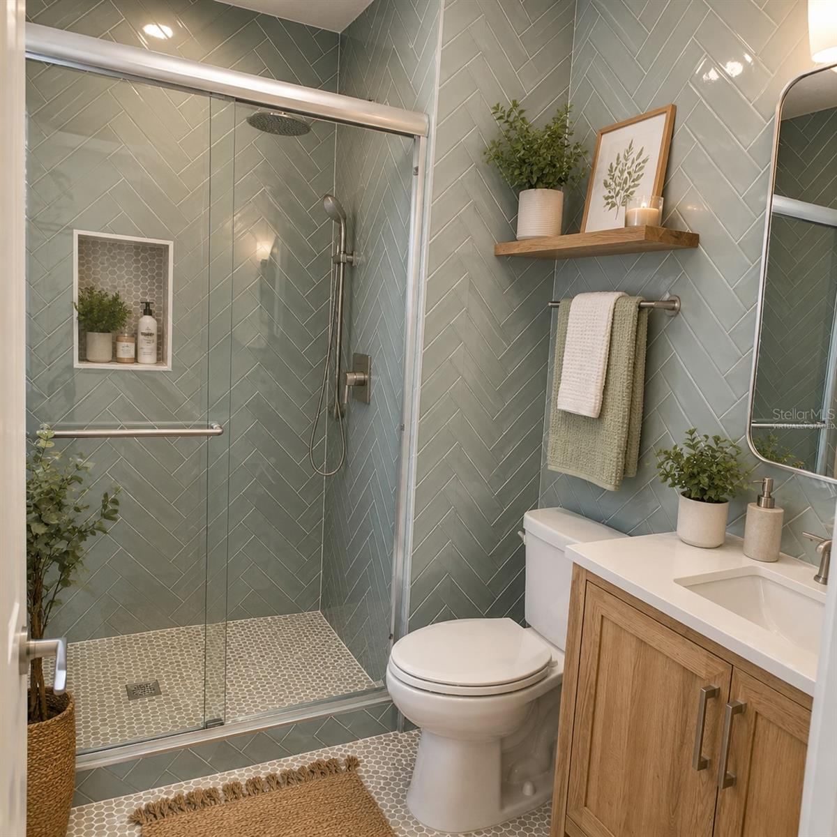 Photo 19 of 20: Virtually Staged. Primary bathroom with floor to ceiling herringbone tile and rainfall shower head