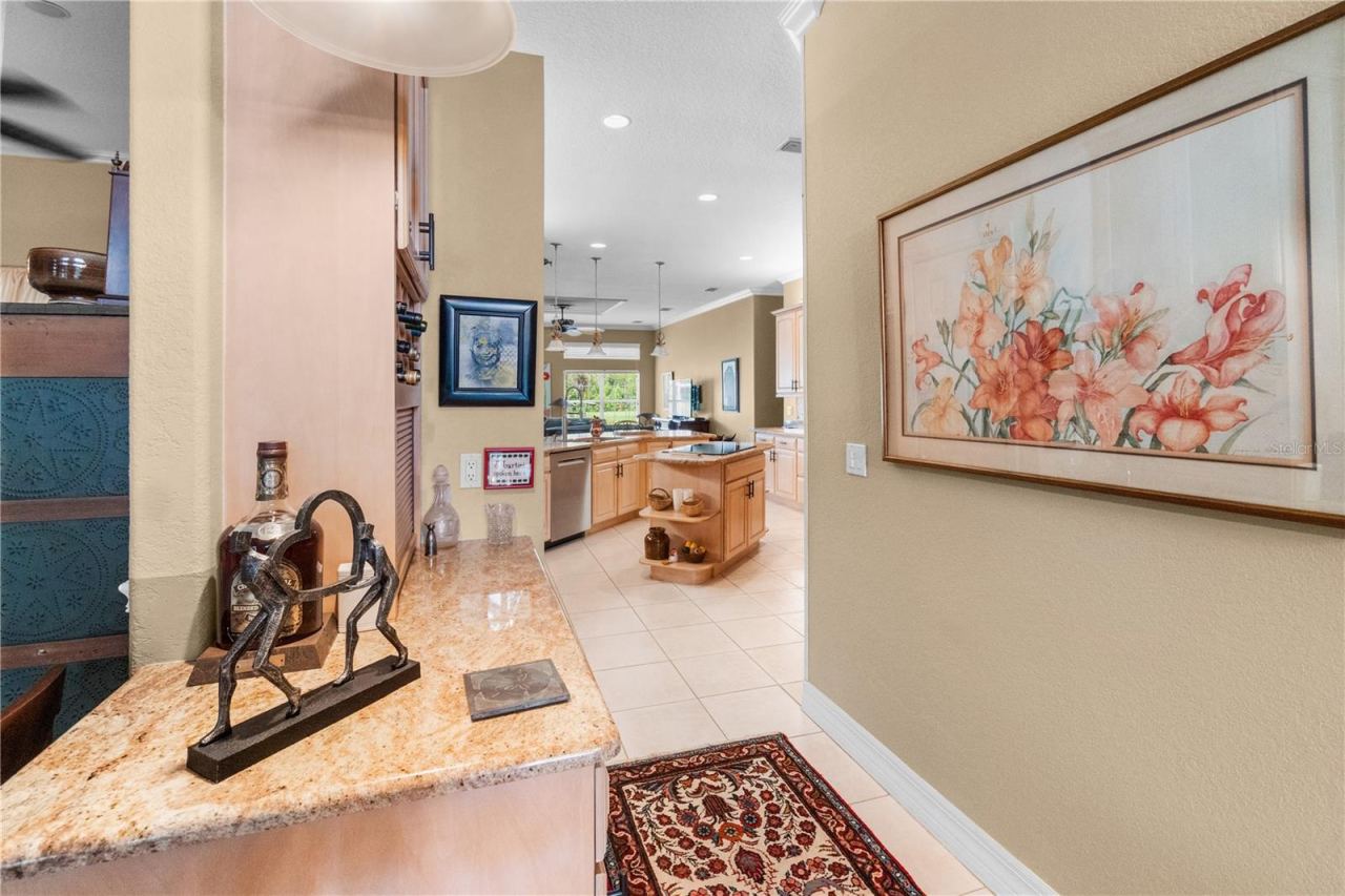 Photo 9 of 20: Hallway leading to kitchen from Dining area