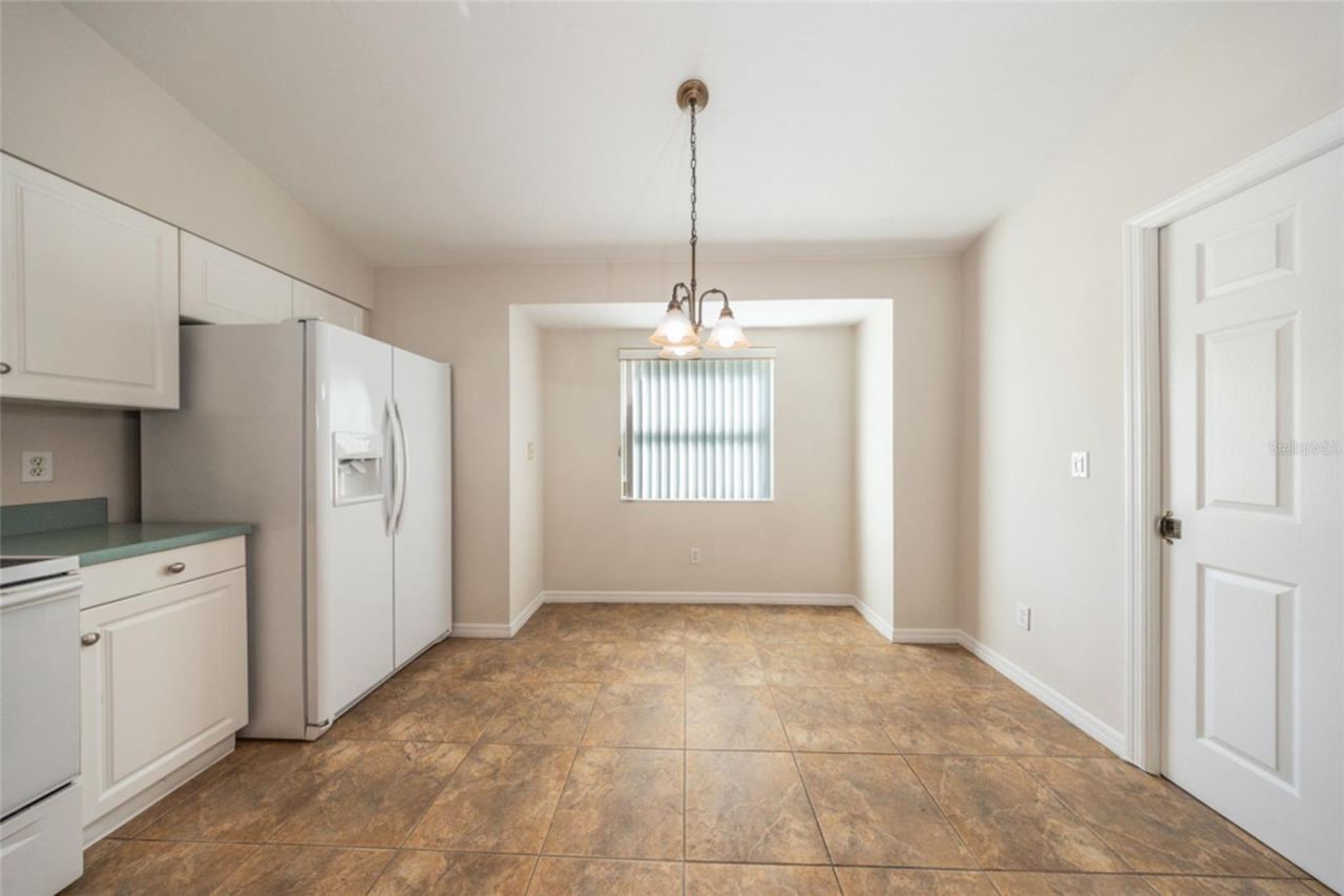 Photo 16 of 20: Great spot by the window for meals. Laundry room is to the right.