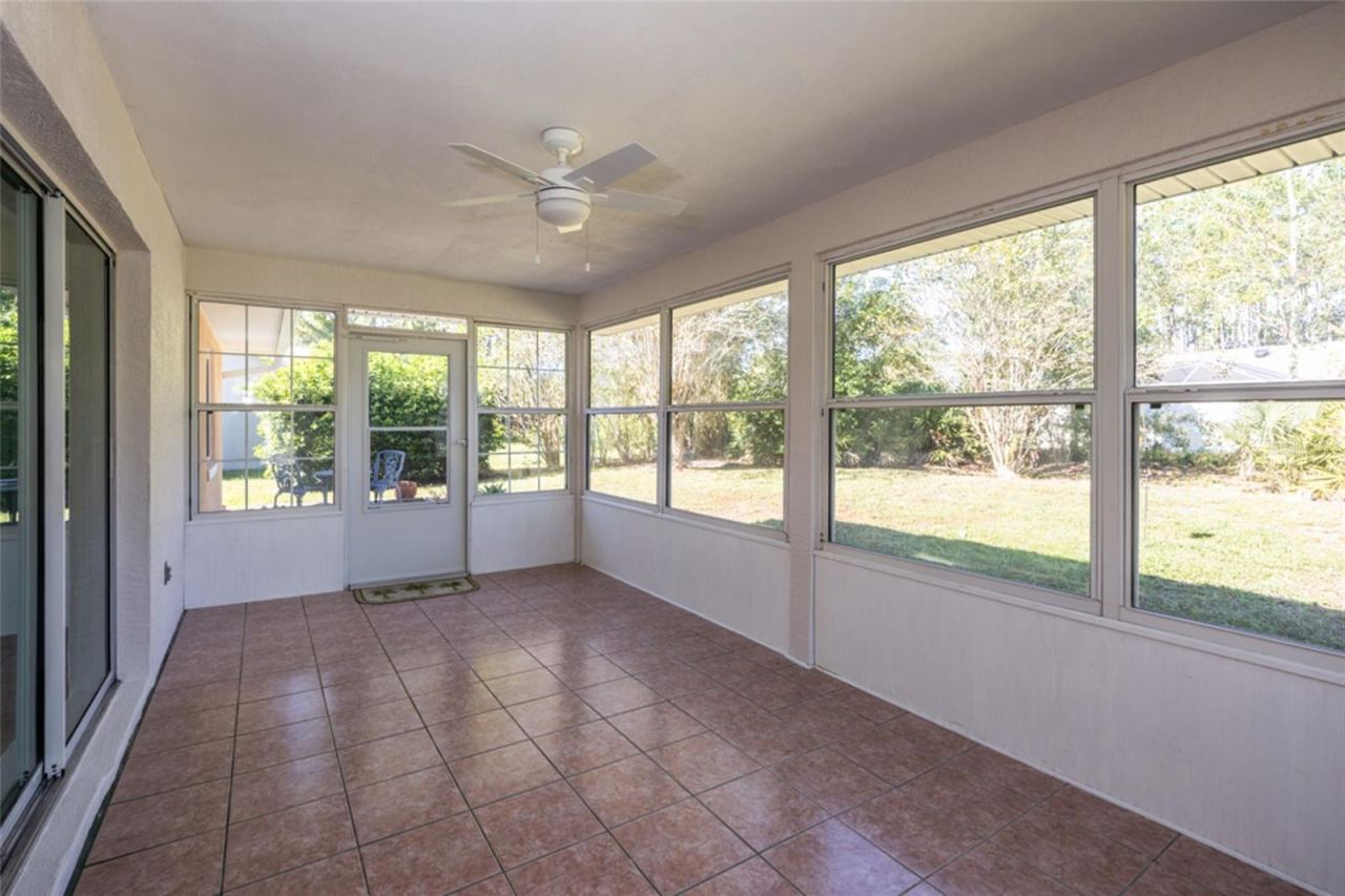 Photo 8 of 20: Florida room with tile flooring