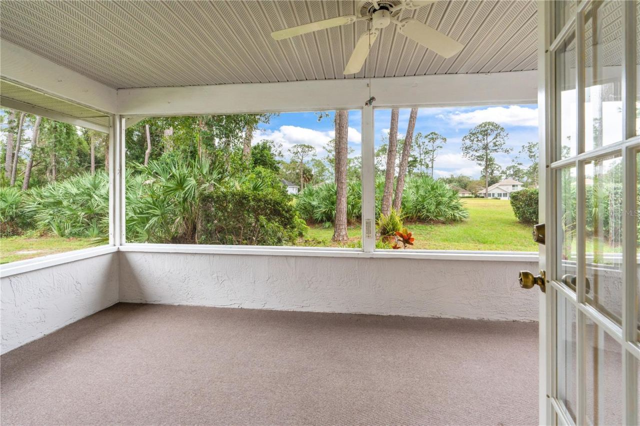 Photo 19 of 20: Screened Porch Overlooks Backyard