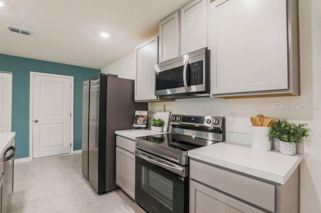 Photo 5 of 20: Model home - actual features may vary.