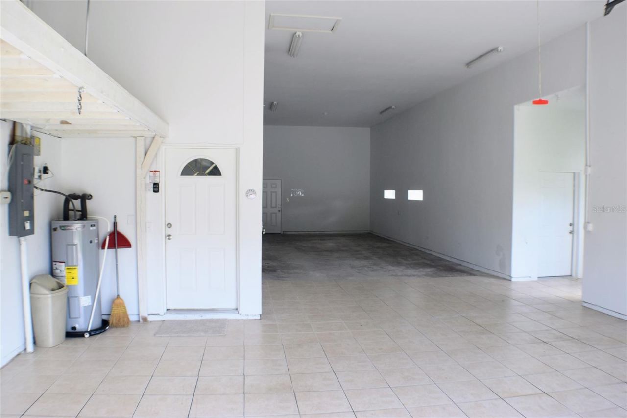 Photo 3 of 20: Large Garage with floored storage above.
