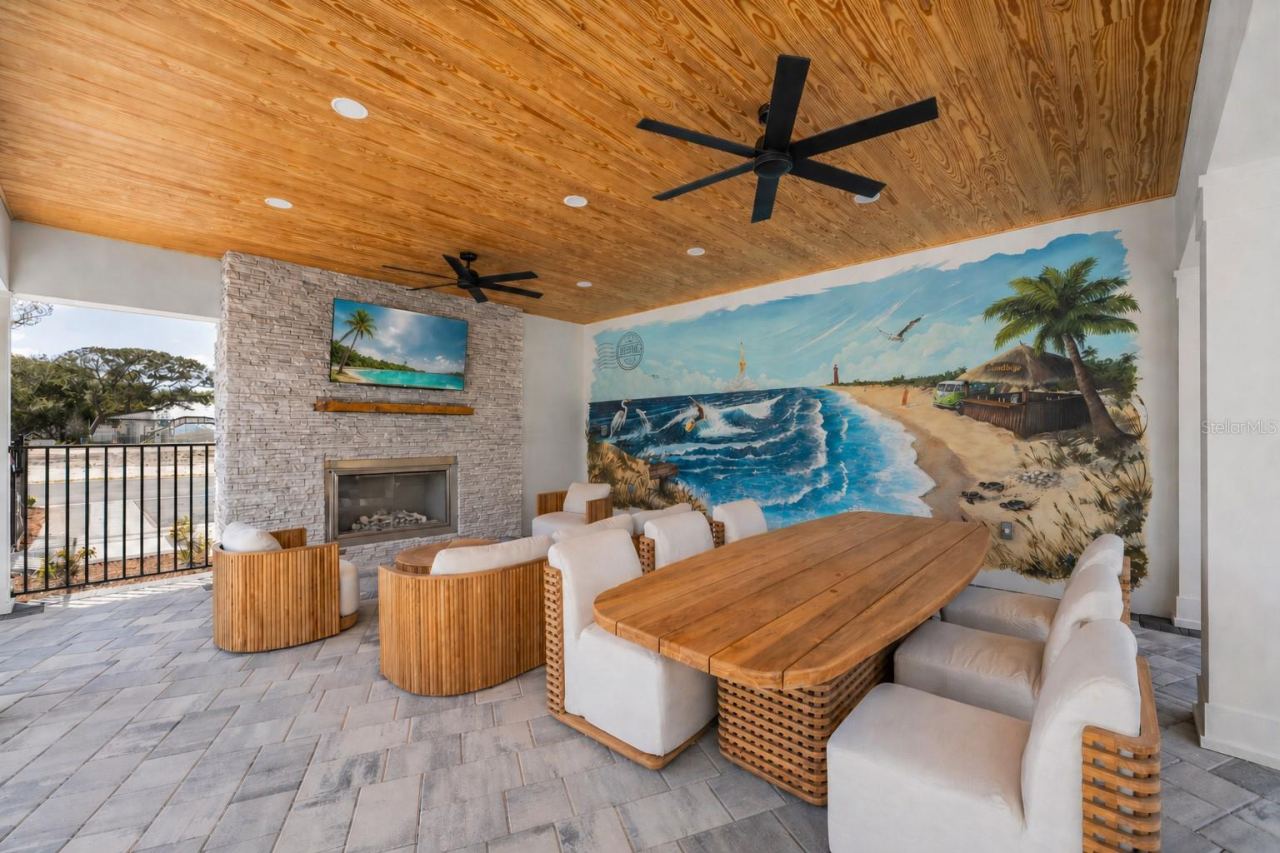 Photo 16 of 20: Community gathering area with fireplace and TV