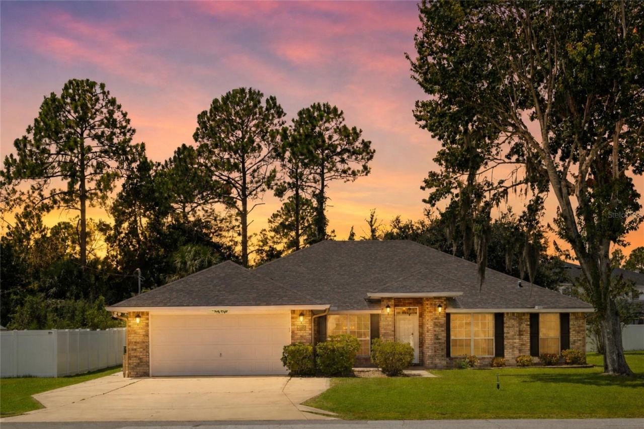 Photo 1 of 20: Evening View of the Exterior of the Home