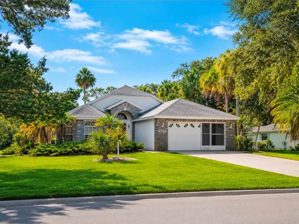 Photo 1 of 20: Welcome to 1308 S Riverside Dr.