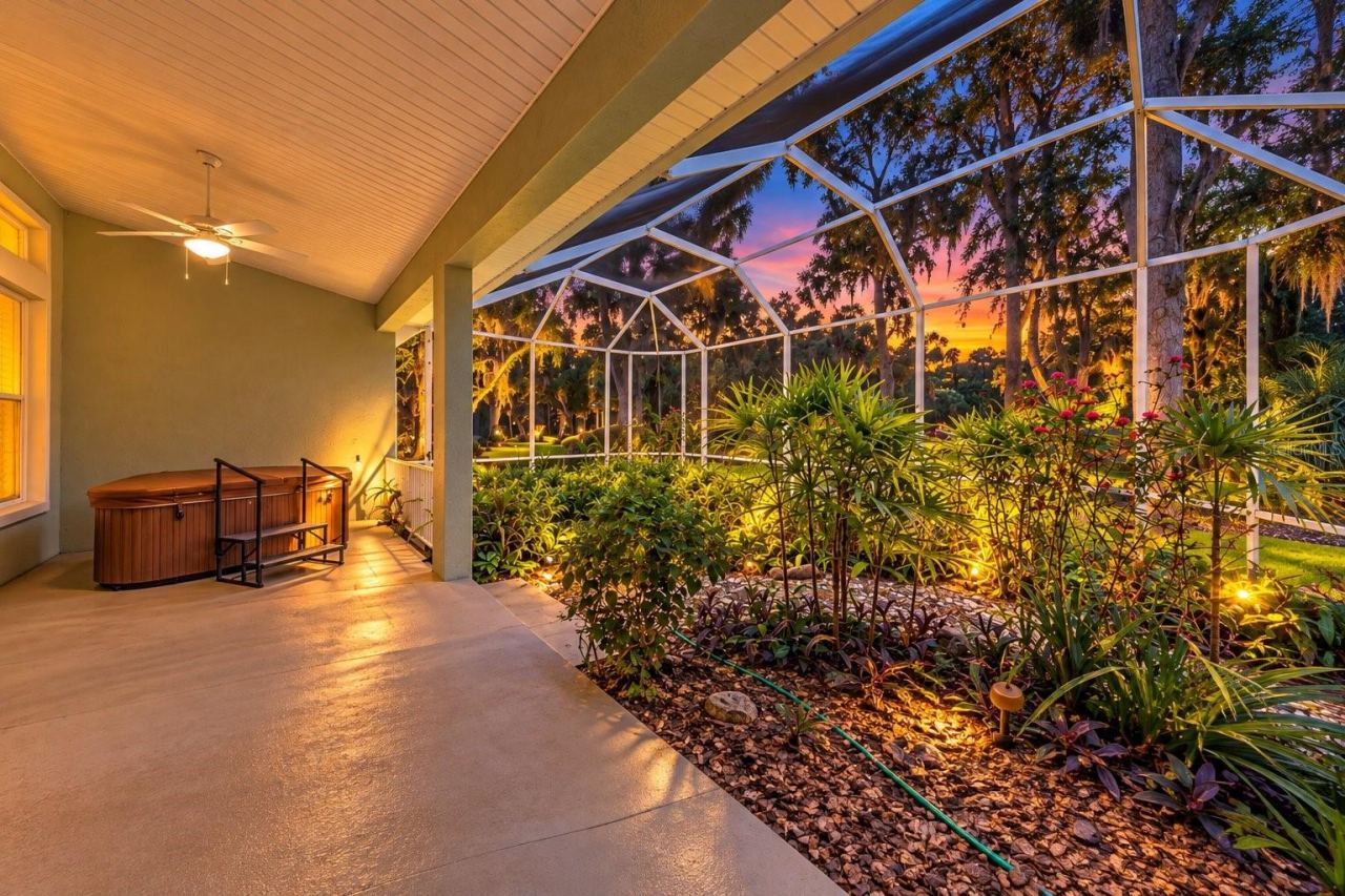 Photo 3 of 20: Evening view of screened in lanai
