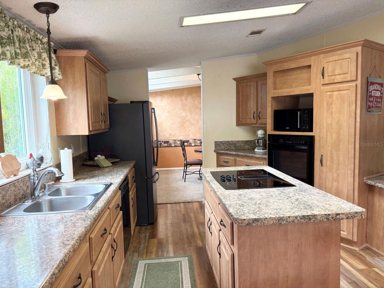 Photo 14 of 20: Kitchen with wall oven and cook top