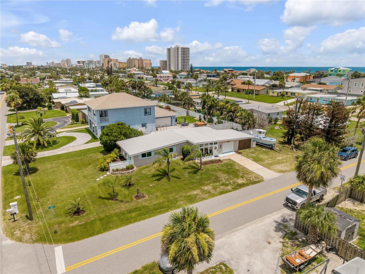 Photo 4 of 20: Elevated view of the home and its corner-lot setting.