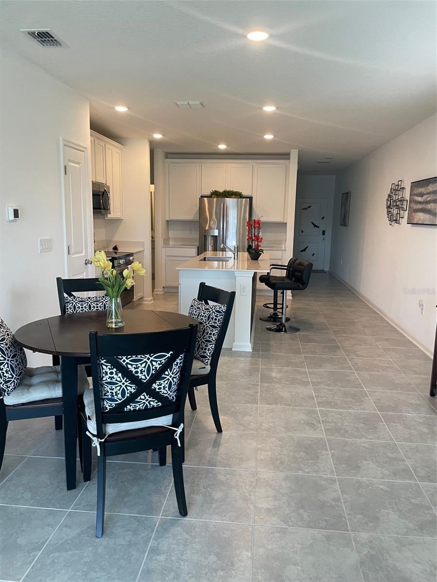 Photo 12 of 20: View from Living Room to Dining Area & Kitchen