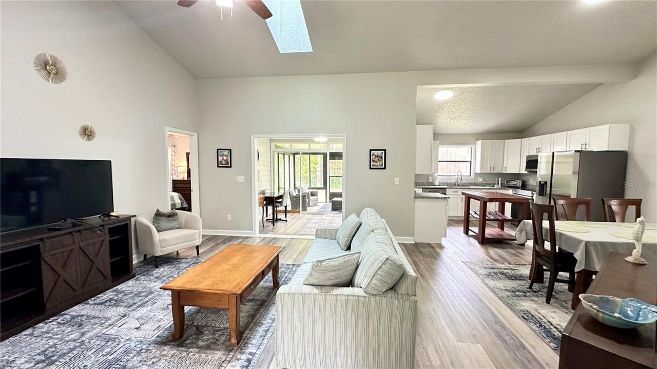 Photo 3 of 20: front hall view into main living area