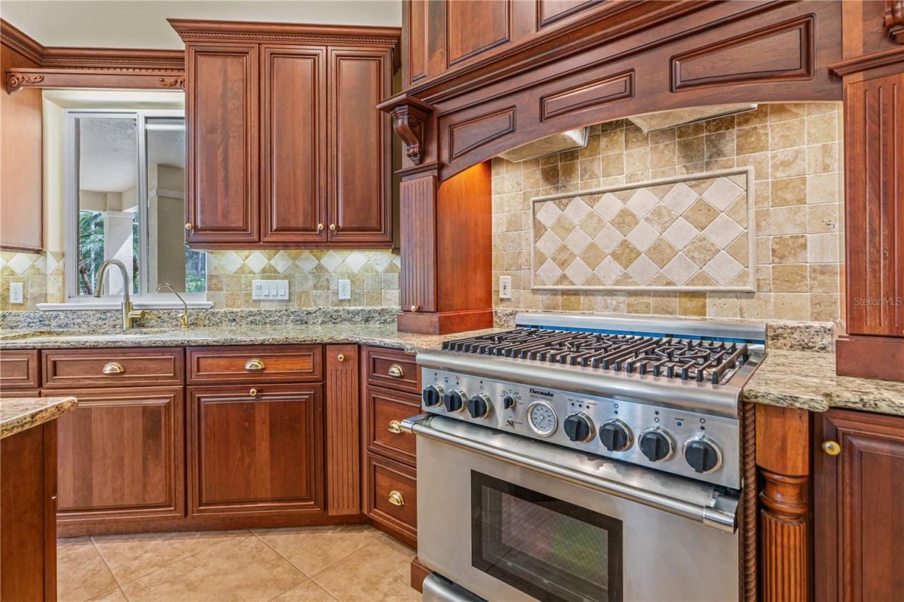 Photo 11 of 20: Kitchen-View Of Range & Cabinetry