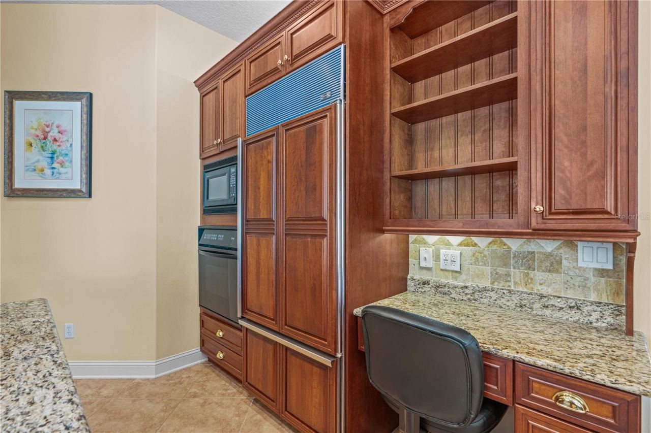 Photo 12 of 20: Kitchen-View Of Built-In Workspace