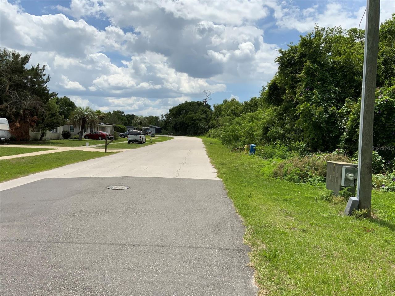 Photo 11 of 14: Lot is on Right After Utility Pole