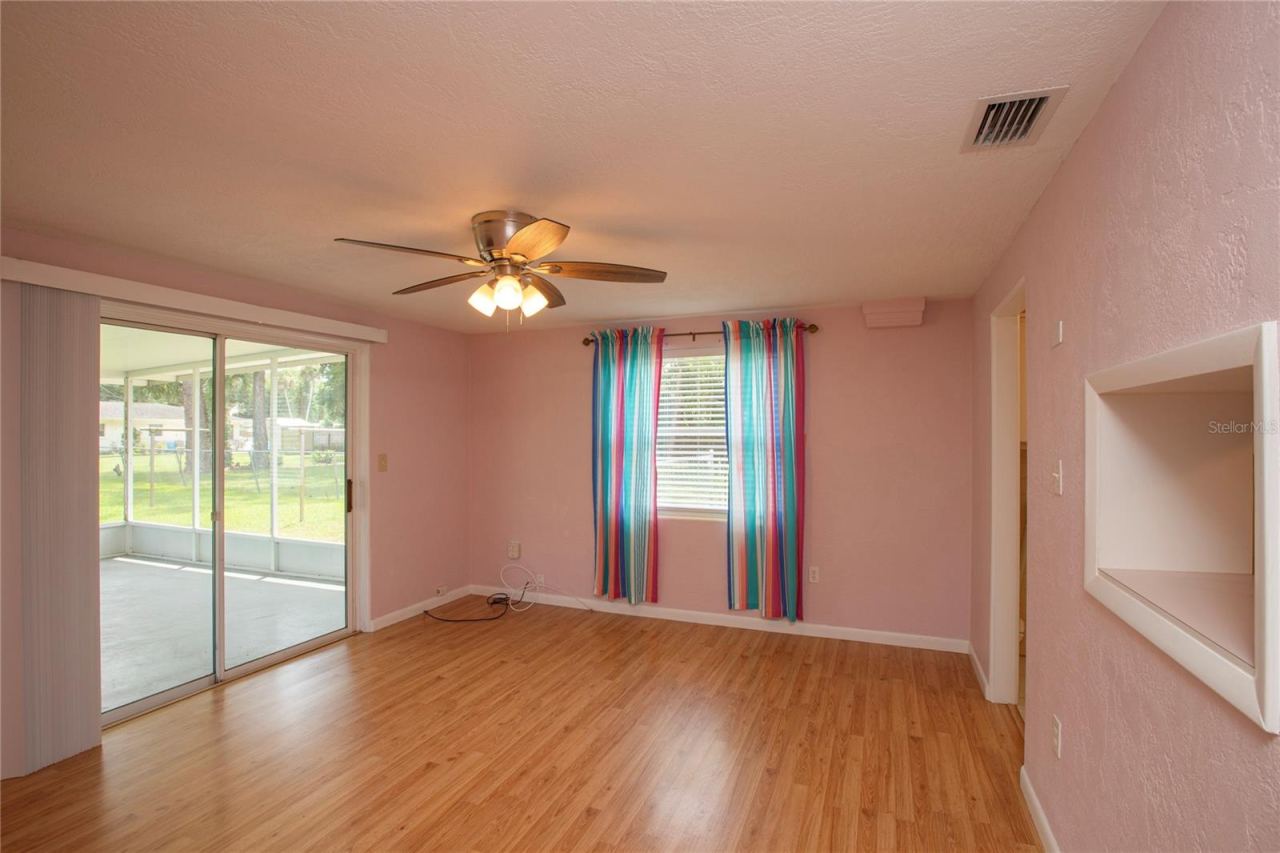 Photo 5 of 20: FAMILY ROOM WITH SLIDERS TO SCREENED PORCH