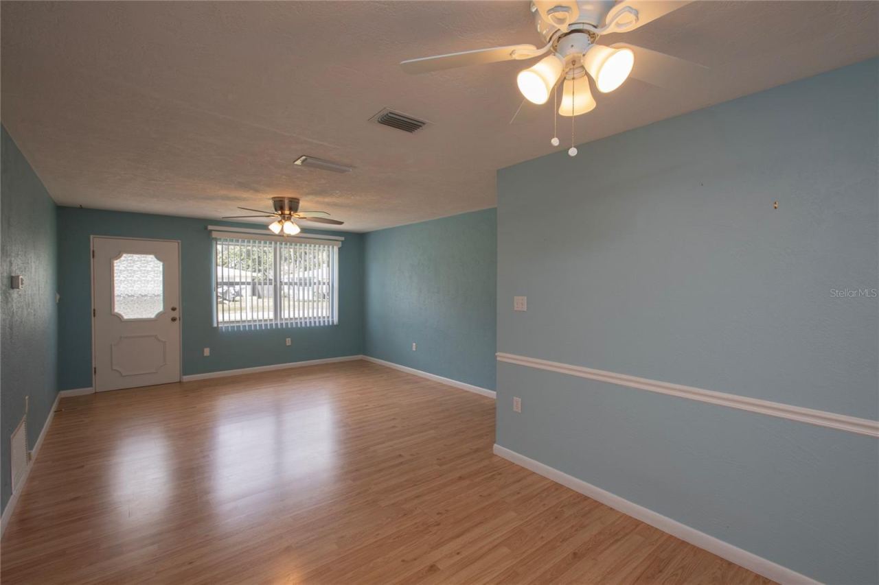 Photo 3 of 20: FRONT DOOR TO LIVING ROOM, DINING ROOM