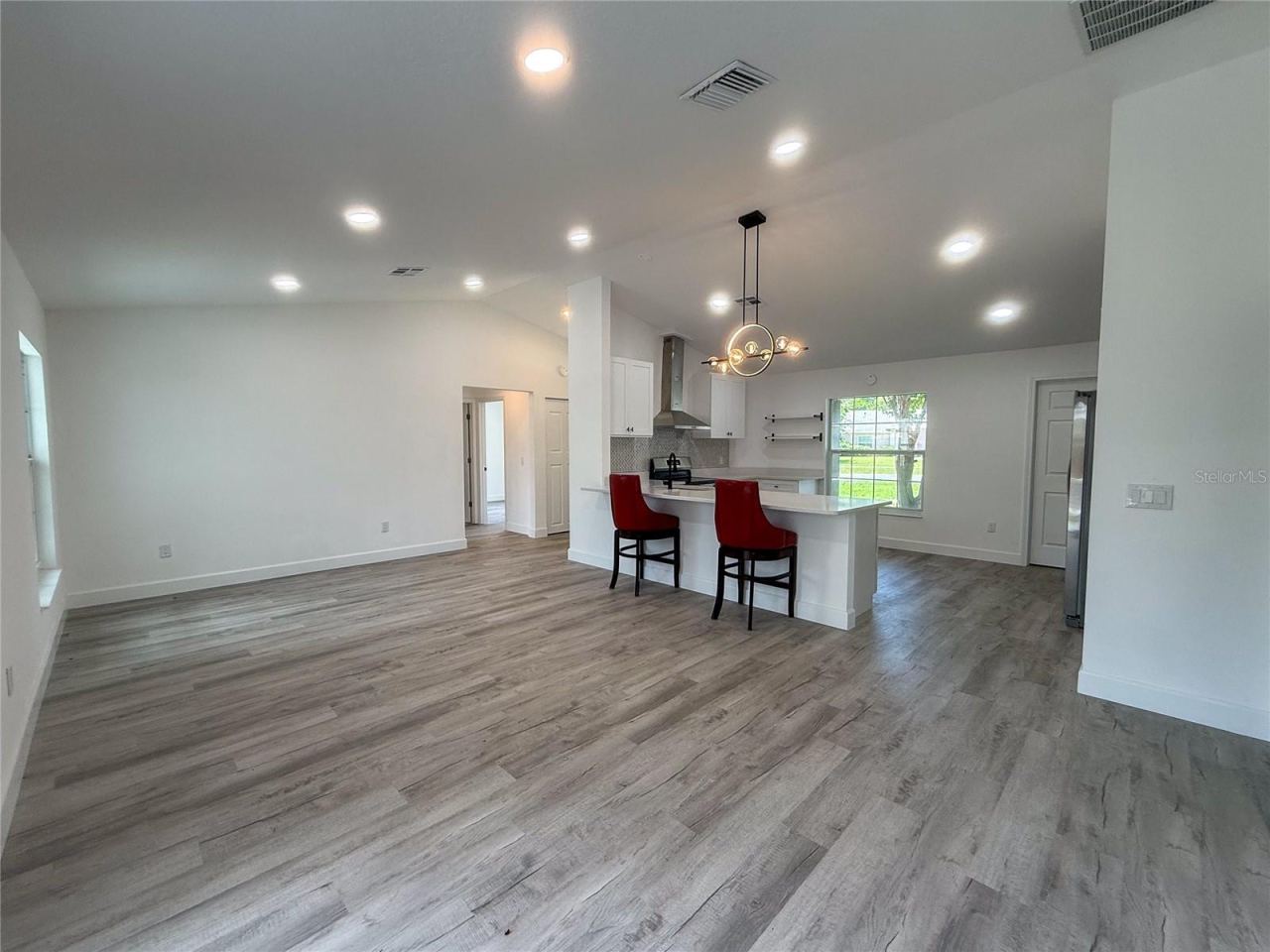 Photo 7 of 20: LIVING ROOM W/ KITCHEN VIEW