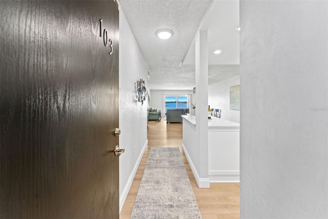 Photo 5 of 20: Welcome & come on in to unit #103- no elevators or stairs needed.