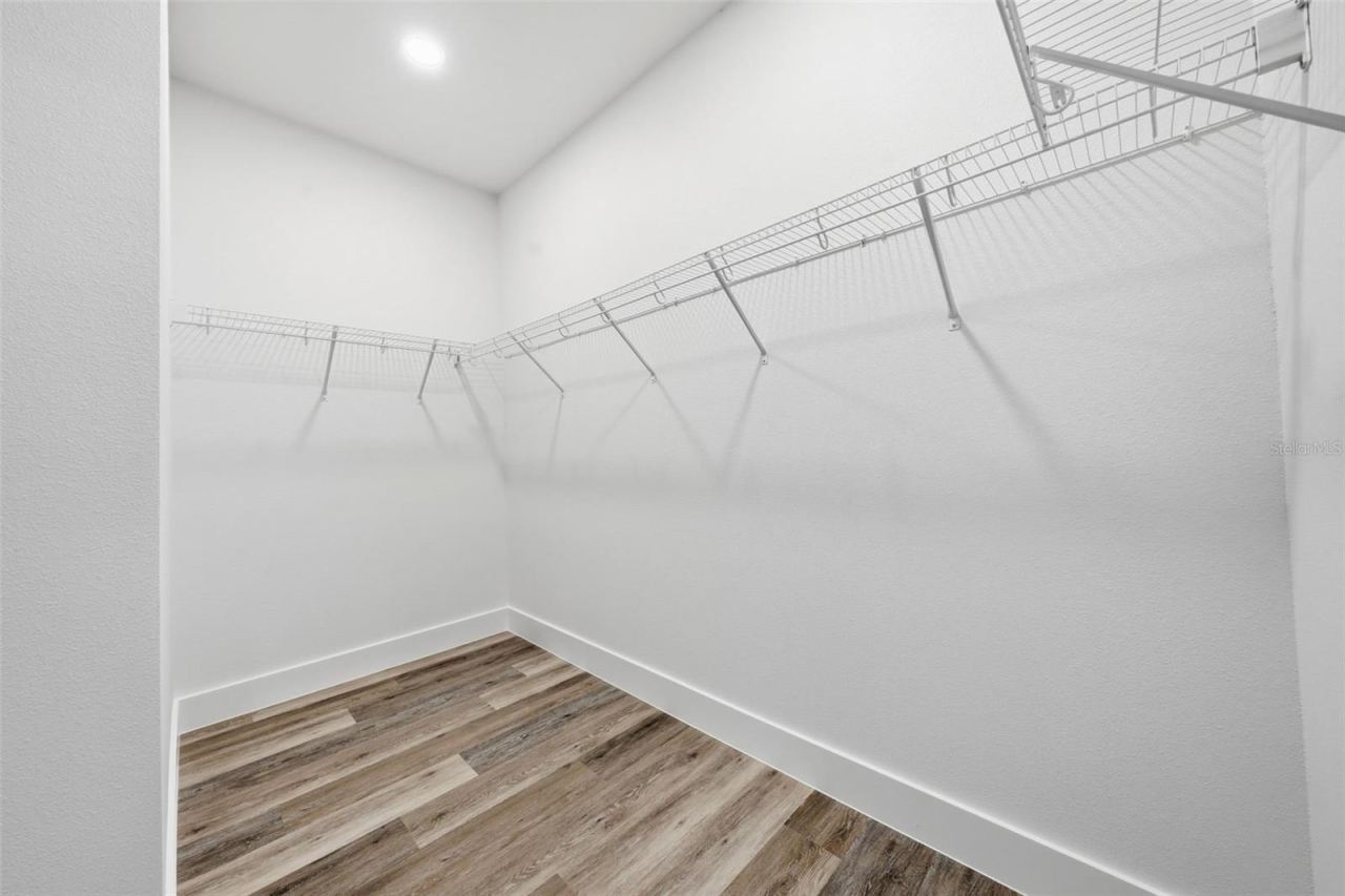 Photo 11 of 20: Primary Walk-In Closet