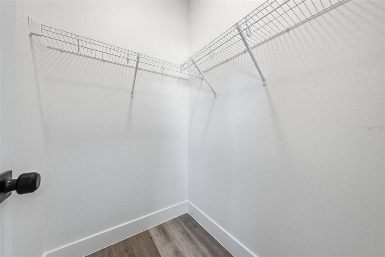 Photo 17 of 20: Bedroom 2 Walk-In Closet