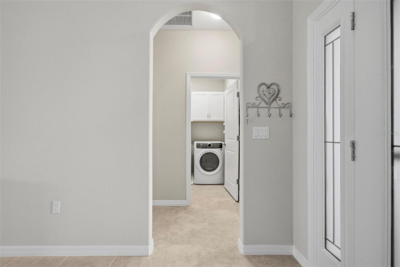Photo 8 of 20: view of hallway to laundry room