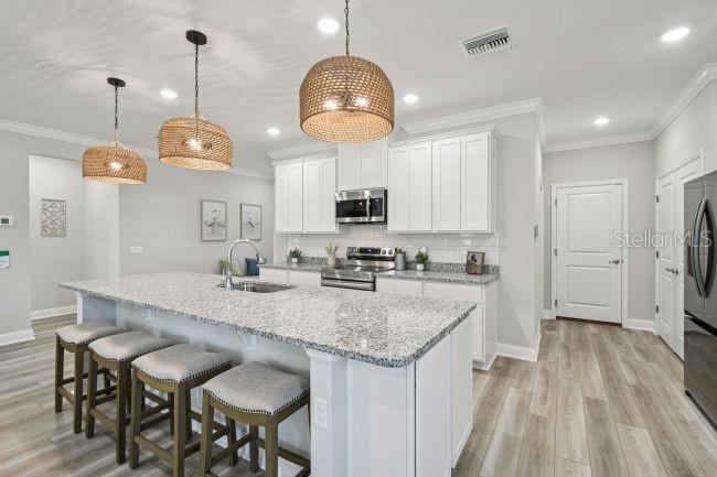 Photo 5 of 20: Model home - actual features may vary.