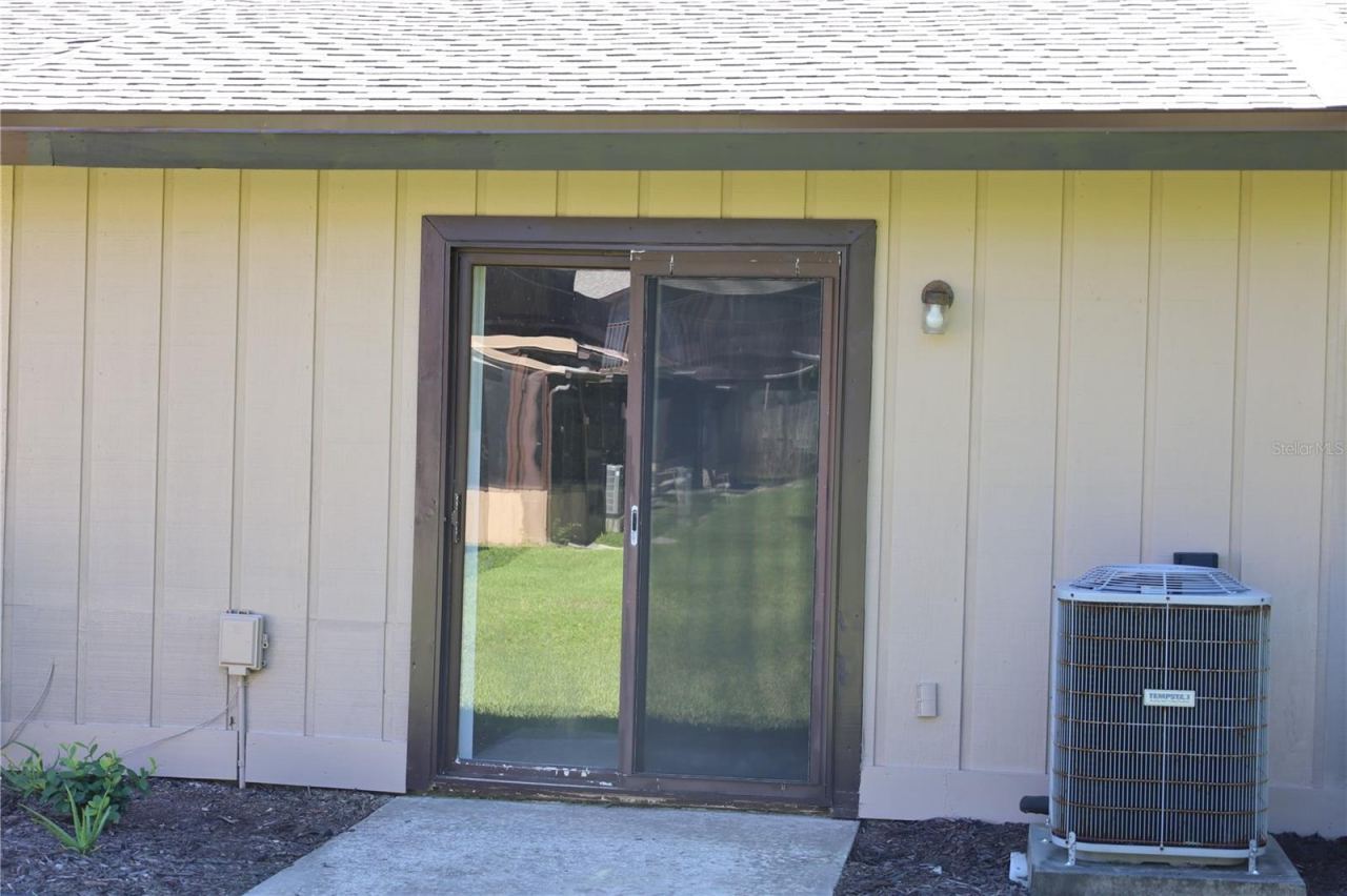 Photo 3 of 20: Freshly painted siding and trim on Patio