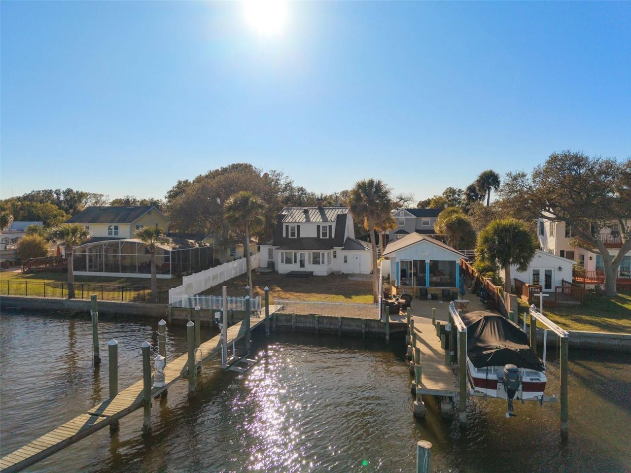 Photo 3 of 20: Aerial view from rear of home over intracoastal waterway
