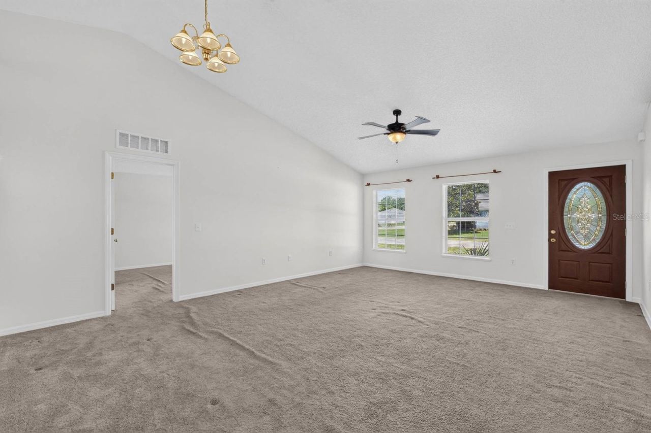 Photo 8 of 20: Front living room/dining room looking towards entrance